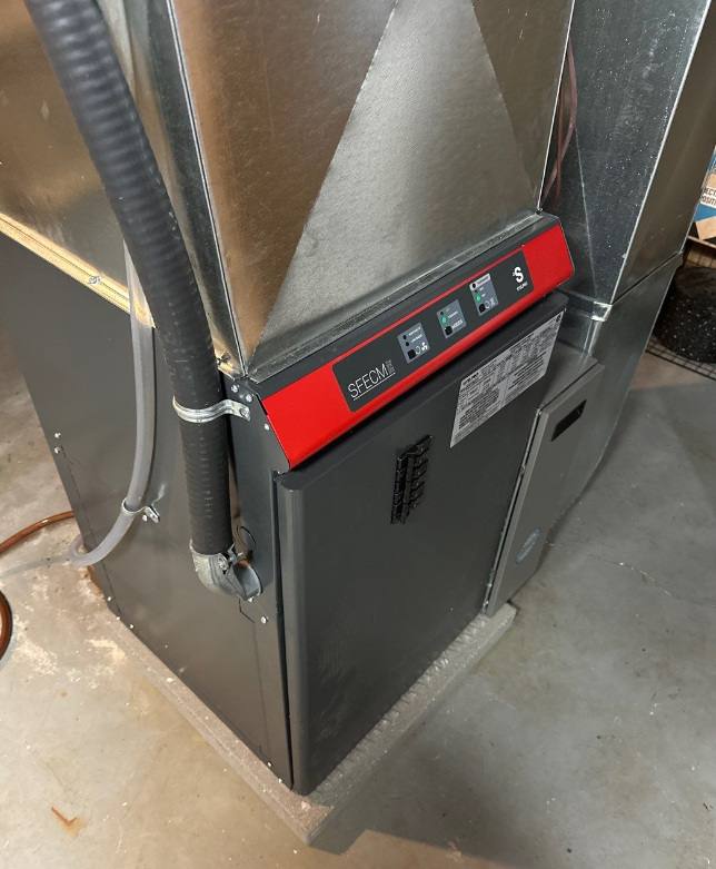 Electric heating equipment connected with flexible metal conduit in a utility room